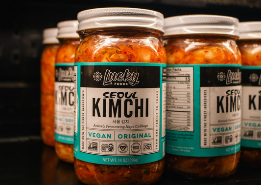 Jars of lucky foods seoul kimchi are displayed.
